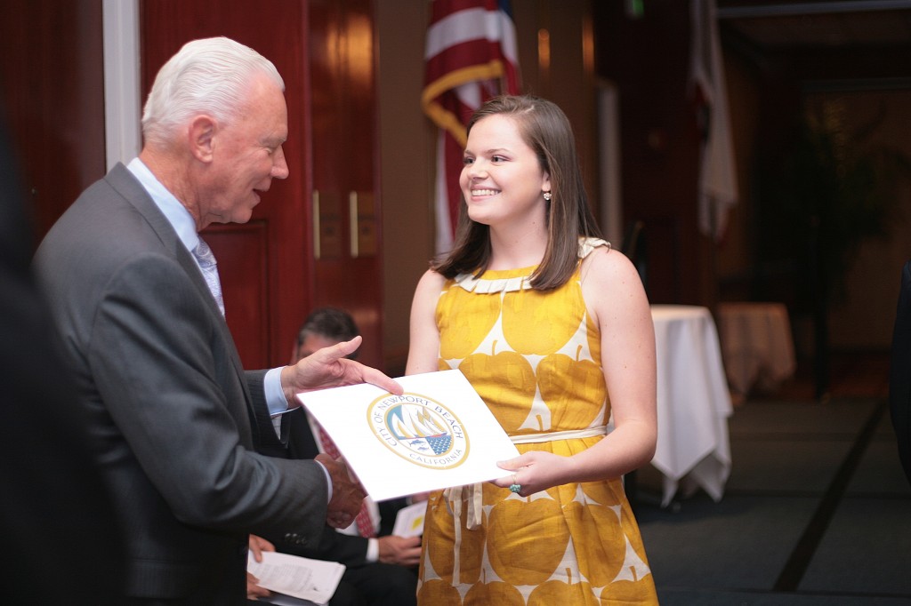 Mayor Rush Hill congratulates Sage Hill School senior Erika Lynn-Green during the ceremony. Lynn-Green said her most memorable moment at Sage was  the long hours working on the student newspaper. She plans on studying molecular biology and English at Yale University. — Photo by Sara Hall