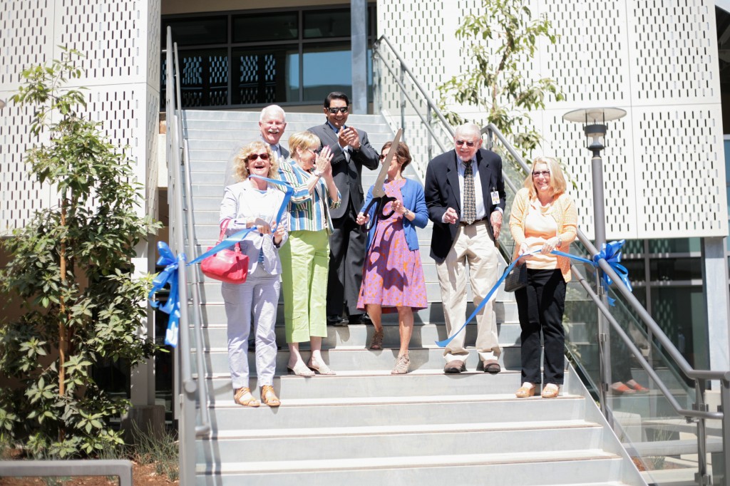 Newport-Mesa Unified School District board of education members, including president Karen Yelsey (holding scissors) and district officials cut the ribbon to officially open the Corona del Mar Middle School enclave during a ceremony on Wednesday. — All photos by Sara Hall ©