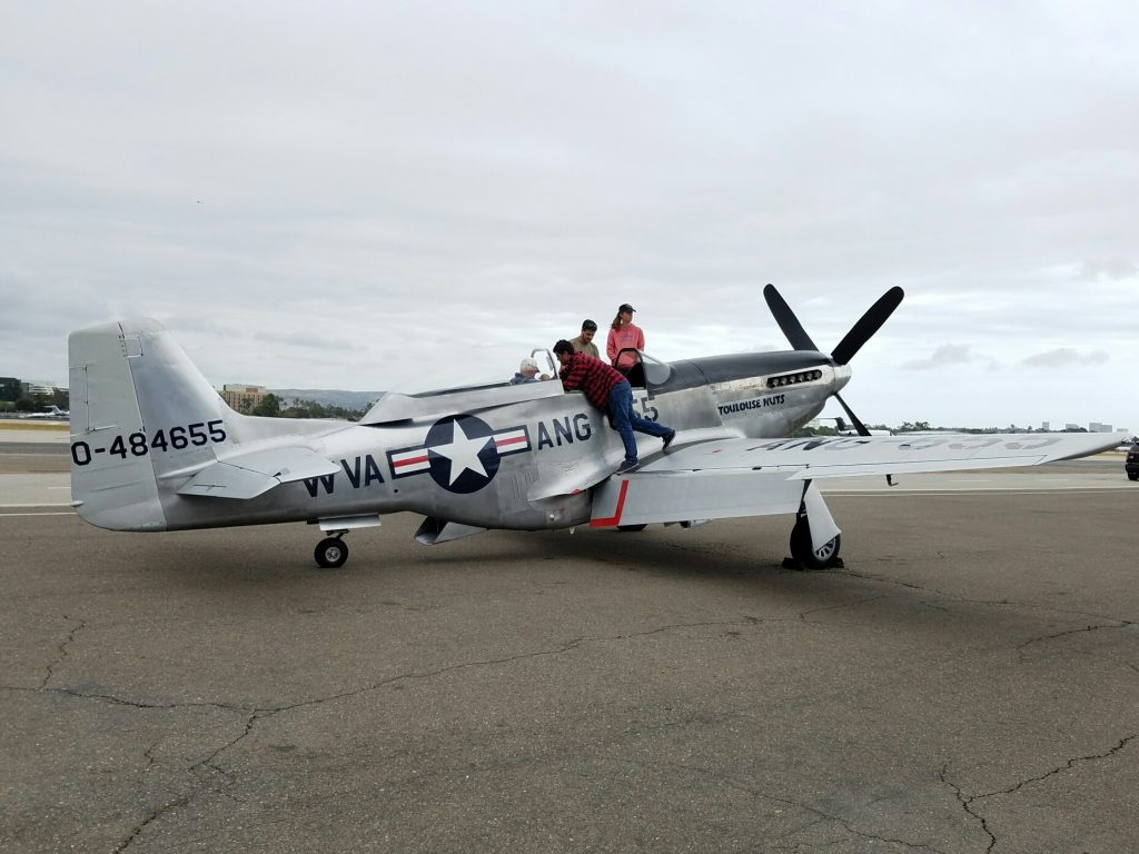 A participant gets prepared for takeoff in the TF-51D Mustang. — Photo by Jim Collins ©